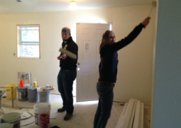 Volunteers build a house