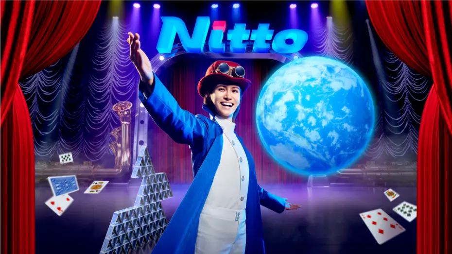 NOT MAGIC, IT’S Nitto！技術で未来を創造する。のイメージ画像。ネオンで光るNittoロゴの下にDr. Nittoが手を広げ、その右側には地球が浮かんでいる。